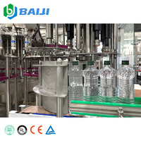 Usine clé en main, machine de remplissage automatique d'huile comestible 8000 BPH, ligne d'embouteillage d'huile de tournesol pour bouteilles en plastique PET