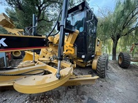 Niveleuse à moteur CAT 140K d'occasion en excellent état, engin de construction lourd pour la construction routière et les travaux de terrassement
