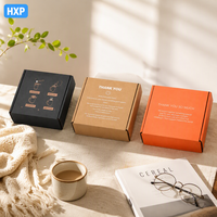Ensemble de boîtes d'expédition en carton ondulé imprimées sur mesure, noir kraft, emballage cadeau orange