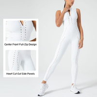 Vêtements de Yoga à la mode blanc creux sculpté conception Non voir à travers combinaison col haut fermeture éclair maigre costume de sport femmes vêtements de sport Onesie