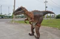 Costume réaliste de dinosaure T-rex avec pattes cachées pour spectacle sur scène, modèle animatronique de dinosaures pour l'amusement