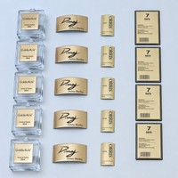 Botellas de aceite esencial de metal de lujo personalizadas 10ml 15ml 20ml pegatinas de logotipo serigrafiadas multicolor en relieve sellado con cuentagotas
