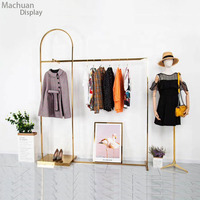 Étagère de présentation de vêtements pour magasin de vêtements pour femmes en or, étagères de magasin de vêtements en or pour robes