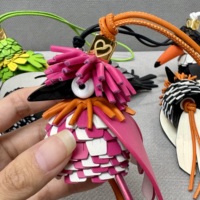 Porte-clés de sac Weilei en cuir véritable, motif oiseau, plumes superposées, luxe, fait main, cadeau haut de gamme, vente en gros OEM