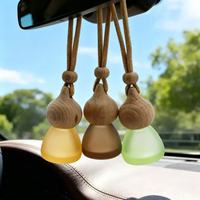 Nouveau modèle de flacon vide de 8 ml pour parfum de voiture, en verre dépoli conique avec couvercle en bois, diffuseur d'huiles essentielles, populaire pour la voiture
