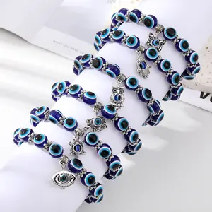 Großhandel Charme Schmetterling Eule Elefant Schildkröte Fatima Hand Frauen Blau Perlen Türkisch Evil Eye Armband Schmuck