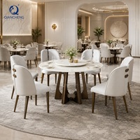 Ensemble de table à manger ronde en marbre avec plateau tournant, finition cuivre brossé, pour projets hôteliers et de restaurants de luxe, vente en gros