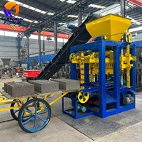 QTJ4-24 26 Machine automatique de fabrication de briques creuses en sable avec pompe, moules pour maisons préfabriquées