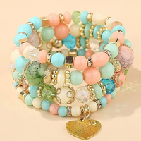 Ensemble de 4 bracelets élégants pour femmes, style bohème ethnique, avec pendentif en forme de cœur, multi-couches, perles