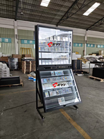 Présentoir rotatif moderne pour cartes avec éclairage LED, rail repositionnable, construction en métal et acrylique pour la vente au détail et en gros