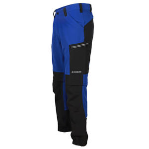 Pantalones de Trabajo para Hombre Xinke, de Algodón Elástico, con Piernas Desmontables, Impermeables, para Fábrica o Taller, Diseño en Bloques de Color Azul y Negro - Product Image 1