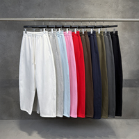 Nouveau pantalon d'hiver vintage couleur unie coupe sabre en molleton épais, style streetwear ample, avec coupe 3D incurvée et effet drapé