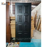 Porte d'entrée principale classique en bois massif noir sculpté, avec relief floral traditionnel, pour villa