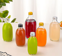 Bouteille en verre sodocalcique transparent scellée en stock pour jus infusé à froid, thé au lait, vin de fruits, boissons; utilisation quotidienne DIY, sérigraphiée