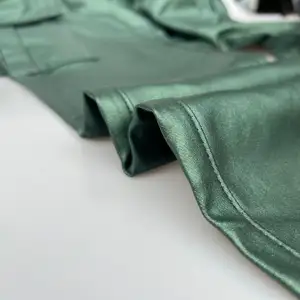 Tecido de nylon de rayon chique com pingente prateado para calças jeans femininas elegantes, com desenho prensado e respirável