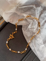 2024 nouvelle lumière luxe métal noeud épissage OT boucle naturel perle d'eau douce collier clavicule chaîne bijoux usine Offre Spéciale
