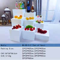 9 pièces de supports de buffet modernes pliables en plastique blanc avec surface polie pour la présentation de desserts et de plats lors de réceptions