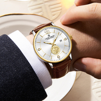 Montre à quartz LOUIE JUELEN Fashion Coin Business |   Logo personnalisé disponible |   Pointeur lumineux, bracelet en cuir véritable étanche à 30 m