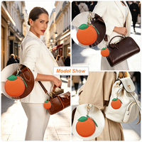 Porte-monnaie portable en cuir pleine fleur véritable 2-en-1 de qualité supérieure, en forme d'orange, pour ranger rouge à lèvres et écouteurs