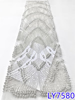 Tissus en dentelle à paillettes jaunes dorées de luxe NI.AI pour robe de soirée de mariage, tissus en dentelle à gros perles brodées de haute qualité