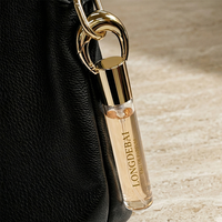 Porte-clés personnalisé avec logo, flacon de parfum vide 10ml 15ml 20ml, flacon de parfum rond en verre, flacon de parfum fantaisie avec bouchon en zamac