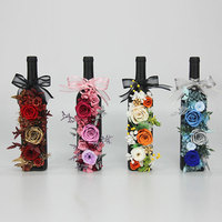 Vente en gros de fleurs et plantes éternelles préservées dans une bouteille de vin rouge, décoration d'intérieur, cadeau, rose en verre, fête des mères, remise de diplôme