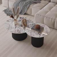 Table basse ronde moderne en marbre avec base cannelée, table centrale minimaliste pour salon