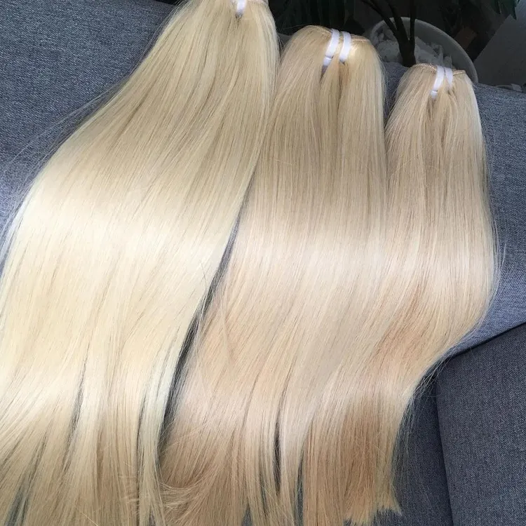 Vente en gros de paquets de cheveux humains bruts à Double dessin blond 613, cuticule non traitée, paquets de cheveux blonds alignés, vente en gros