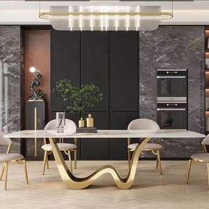 Bàn ăn hiện đại với chân đế thép không gỉ mạ vàng, mặt bàn gốm sứ, thiết kế hình chữ nhật, dành cho nhà ở sang trọng, khách sạn hoặc căn hộ. - Product Image 1