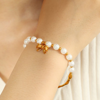 Bracelet à breloques en acier inoxydable plaqué or 18 carats, demi-perles naturelles, demi-métal, avec nœud, style vintage et tendance Bingxin, cadeau pour femme