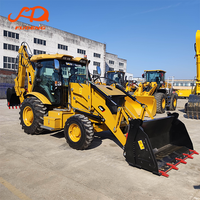 Chargeuse-pelleteuse CAT 428F d'occasion en bon état, 4x4, machine de construction multifonctionnelle, à vendre