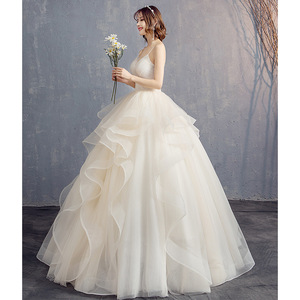 White V-Neck Ball Gown Wedding Dress Champagne Color Floor Length Formal Bridal Dress With Straps Natural Waistline - Product Image 2