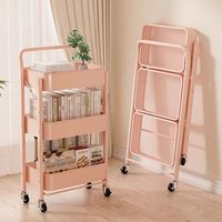 Chariot de rangement multifonctionnel pliable à trois niveaux Chariot de plancher en métal Présentoir empilable pour snacks Rangement pour snacks