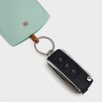 Porte-clés créatif en cuir avec cordon de serrage, style pochette extractible, personnalisable avec logo, pour femmes