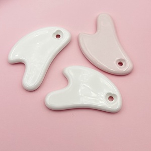 Masseur Gua Sha en céramique à tenir à la main avec bord lisse pour le <span class=keywords><strong>visage</strong></span> et le corps, thérapie imperméable pour la physiothérapie et l'<span class=keywords><strong>acupuncture</strong></span> - Product Image 2