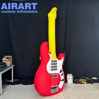 Décoration de scène de musique sur mesure en usine guitare rouge gonflable, ballon de modèle de jouet de guitare gonflable