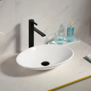 Unico moderno europa disegni ovali piccola ciotola da bagno lavabo da appoggio in ceramica lavabo artistico