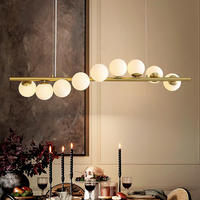 Lustre linéaire de salle à manger de 48 pouces, en métal doré américain et verre, suspension en forme de boule pour îlot de cuisine, idéal pour salle à manger et cuisine