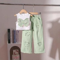 Ensemble deux pièces d'été pour filles : Blouse sans manches style européen avec nœud appliqué et short en jean déchiré