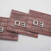 Écusson en cuir jeans noir personnalisé avec logo d'étiquette en métal étiquettes de vêtement personnalisées étiquettes en cuir lavables pour vêtements