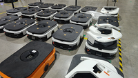 AGV autonome laser SLAM de 50 kg sans marqueurs QR pour le transfert de marchandises palettisées du convoyeur vers l'emballageur de palettes pour usine