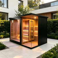 Cabine de bien-être extérieure avec sauna et douche, cadre noir, parois vitrées, pour usage en bord de piscine, resort ou villa