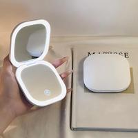 Miroir de maquillage compact portable pour femmes, miroir pliable à LED pour retouches, miroir de luxe haut de gamme de petite taille