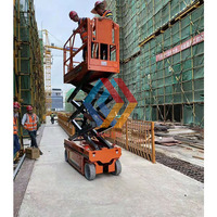 Plateforme de travail électrique hydraulique à batterie de 6 m, 10 m, 12 m, 14 m, 300 kg, fabriquée en Chine, avec échelle à ciseaux automatique, location avec moteur d'entraînement