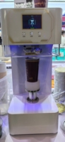 Scelleuse à induction électrique semi-automatique de conception moderne pour bouteilles et canettes, haute durabilité, économie d'énergie, machine d'emballage pour boissons
