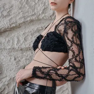 Vêtements sexy haut de gamme personnalisés pour femmes chemisier à manches longues avec attache croisée Bandage à nouer Haut court en maille noire transparente évidée