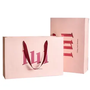 Wholesale Custom Luxury Cardboard Paper Bag With Silver Foil Logo Clothing Packaging Bags For Boutique And Shopping