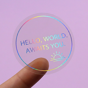 Pegatina Circular Transparente Personalizada de PET con Texto Holográfico '<span class=keywords><strong>Hello</strong></span> World' e Ícono de Sol Nascente para Mercancía de Marca, Venta al Por Mayor - Product Image 1