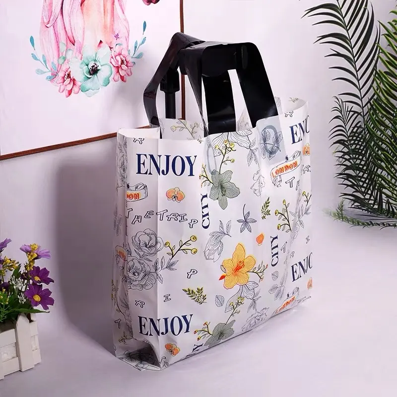 Bolsa de cosméticos de alta calidad, ropa, zapatos, bolsa de regalo con estampado de flores de PVC, bolsas de plástico para compras con logotipo personalizado
