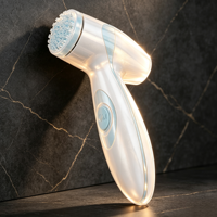 Appareil de nettoyage facial électrique avec tête de brosse en silicone de qualité alimentaire, étanche, pour le traitement de l'acné, le blanchiment et l'exfoliation, rotatif